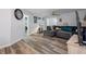 Inviting living room featuring modern flooring, neutral decor and ample seating at 19496 Wildwood Dr, Brooksville, FL 34601