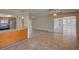 Spacious living area with sliding glass doors leading to outdoor patio at 2105 Sugarbush Dr, Holiday, FL 34690