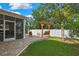 Beautiful backyard featuring a pergola swing and outdoor seating area at 2387 Bartolo Dr, Land O Lakes, FL 34639