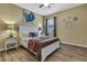 Charming bedroom features a cozy bed, natural light, and stylish decor at 2387 Bartolo Dr, Land O Lakes, FL 34639