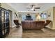 Spacious bonus room with hardwood floors and plenty of seating space at 2387 Bartolo Dr, Land O Lakes, FL 34639