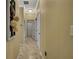 Hallway featuring neutral wall colors and tile floors at 2387 Bartolo Dr, Land O Lakes, FL 34639