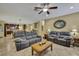 Spacious living room seamlessly connects to the dining area and kitchen, perfect for entertaining and everyday living at 2387 Bartolo Dr, Land O Lakes, FL 34639