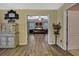 Cozy main bedroom with neutral color scheme and hardwood flooring at 2387 Bartolo Dr, Land O Lakes, FL 34639