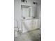Bathroom featuring a double sink vanity with quartz countertops, and modern fixtures at 2504 E 28Th Ave, Tampa, FL 33605