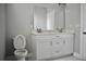 Clean bathroom featuring a double sink vanity with quartz countertops, and modern fixtures at 2504 E 28Th Ave, Tampa, FL 33605