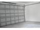 Clean garage with freshly painted door and new hardware at 2504 E 28Th Ave, Tampa, FL 33605