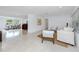 Bright living room featuring polished floors, recessed lighting, and modern furnishings at 2662 Oakbrook Dr, Largo, FL 33770