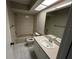 Full bathroom featuring a skylight, bathtub and shower combination, and single sink vanity at 2826 Rampart Cir, Clearwater, FL 33761