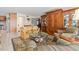 Comfortable living room featuring a plush sofa, armchairs, and elegant decor at 3021 Alton Dr, St Pete Beach, FL 33706