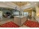 Open kitchen with a large island and seating that overlooks the living room and breakfast nook at 304 Hawk Talon Dr, Lithia, FL 33547