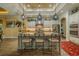 Spacious kitchen featuring a large island with seating, pendant lighting, and stainless steel appliances at 304 Hawk Talon Dr, Lithia, FL 33547