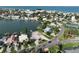 Scenic aerial view of land available for purchase, near water, surrounded by residential neighborhood, offering investment potential at 305 Harbor Dr, Indian Rocks Beach, FL 33785