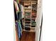 Organized walk-in closet with shelves, hanging clothes, and hardwood floors at 324 6Th Ave, Indian Rocks Beach, FL 33785