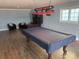 Recreation room with a pool table, recessed lighting, and stylish decor at 324 6Th Ave, Indian Rocks Beach, FL 33785
