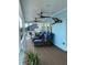 Inviting outdoor seating area on a covered porch with comfortable furniture and scenic views at 324 6Th Ave, Indian Rocks Beach, FL 33785