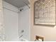 Bathroom featuring tiled shower with a modern fixture at 4018 Highgate Dr, Valrico, FL 33594
