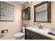 Bathroom featuring a vanity, mirror, lighting, and medicine cabinet at 4018 Highgate Dr, Valrico, FL 33594