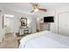 Bedroom with decor, tv, walk-in shower, and a makeup vanity at 4018 Highgate Dr, Valrico, FL 33594