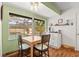 Bright breakfast nook with screened pool view at 4018 Highgate Dr, Valrico, FL 33594