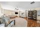 Comfortable living room with wood floors, plush carpeting and a ceiling fan at 4018 Highgate Dr, Valrico, FL 33594