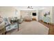 Spacious living room offering cozy seating, natural light, and views into the adjacent rooms at 4018 Highgate Dr, Valrico, FL 33594