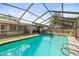 Inground swimming pool with a screened enclosure at 4018 Highgate Dr, Valrico, FL 33594