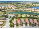 Aerial view displaying the property's location within a community with ponds and landscaping at 4610 Alexandria Ct, Palmetto, FL 34221