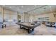 Bright community game room featuring a pool table and kitchenette for entertaining residents at 4610 Alexandria Ct, Palmetto, FL 34221