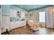 A serene spa room featuring a treatment bed, sink, and calming decor for relaxation at 4610 Alexandria Ct, Palmetto, FL 34221
