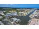 Aerial view of condo community with private marina, boat slips, water access and beautiful waterfront homes at 4939 Floramar Ter # 504, New Port Richey, FL 34652