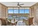 Relaxing lanai with comfortable seating and expansive views of the marina at 4939 Floramar Ter # 504, New Port Richey, FL 34652