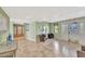 A brightly lit lobby with neutral walls, tile flooring, comfortable seating, and an exit door at 4939 Floramar Ter # 504, New Port Richey, FL 34652