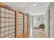 Hallway view of the resident mailboxes featuring tile flooring and neutral paint colors at 4939 Floramar Ter # 504, New Port Richey, FL 34652