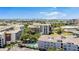 Aerial view of condos with a scenic waterfront and city skyline backdrop at 501 Knights Run Ave # 1335, Tampa, FL 33602