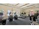 Bright fitness center with modern cardio equipment and wall-mounted mirrors at 501 Knights Run Ave # 1335, Tampa, FL 33602
