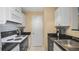 Well-maintained kitchen featuring appliances and functional design, perfect for everyday cooking needs at 501 Knights Run Ave # 1335, Tampa, FL 33602
