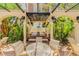 Community outdoor grilling area with two grills and tables and seating at 501 Knights Run Ave # 1335, Tampa, FL 33602