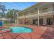 A two story home featuring a backyard oasis with pool and covered patio for entertaining at 5017 Muir Way, Lithia, FL 33547