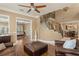 Open-concept living area showcasing hardwood floors, staircase, and dining area at 5017 Muir Way, Lithia, FL 33547