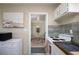 Kitchen view offering sight to dining area, enhancing space appeal at 5365 Flamingo Dr, St Petersburg, FL 33714