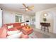 Comfortable living room featuring a large sectional sofa, stylish decor, and open access to other areas of the house at 5365 Flamingo Dr, St Petersburg, FL 33714