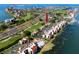 Aerial view of a waterfront condo complex and a golf course at 5736 La Puerta Del Sol S Blvd # 254, St Petersburg, FL 33715