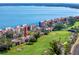 Aerial view of a waterfront condo complex and a golf course at 5736 La Puerta Del Sol S Blvd # 254, St Petersburg, FL 33715