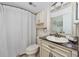 Neutral bathroom featuring a tub-shower combo and traditional décor with a modern vanity at 5736 La Puerta Del Sol S Blvd # 254, St Petersburg, FL 33715