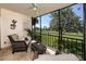Enjoy the views from your screened patio with comfortable seating and views of the golf course at 5736 La Puerta Del Sol S Blvd # 254, St Petersburg, FL 33715