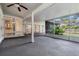 Spacious screened-in porch boasts tiled flooring and natural light at 614 Fayette S Dr, Safety Harbor, FL 34695