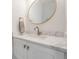 Elegant bathroom featuring a white marble countertop, modern sink, and stylish fixtures at 6904 S Macdill Ave # 1, Tampa, FL 33611
