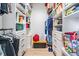 Organized walk-in closet featuring custom shelving and drawers, perfect for storage at 6904 S Macdill Ave # 1, Tampa, FL 33611