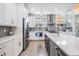 Stylish kitchen with stainless steel appliances, a center island, and modern finishes at 6904 S Macdill Ave # 1, Tampa, FL 33611